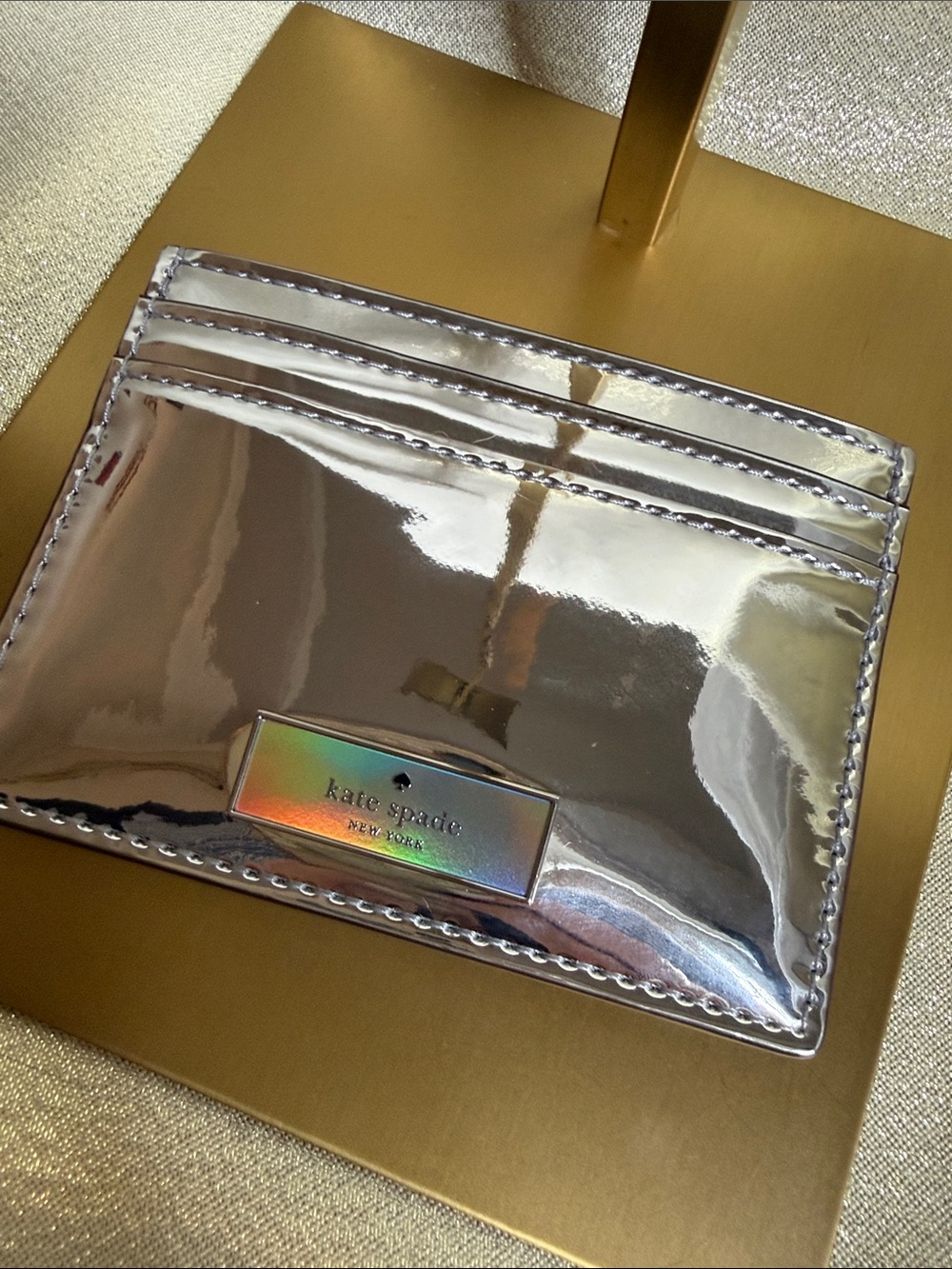 kate spade Iridescent Silver Card Sleeve